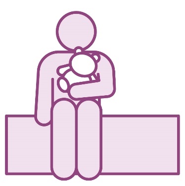 A person sitting on a bench and holding a toy.