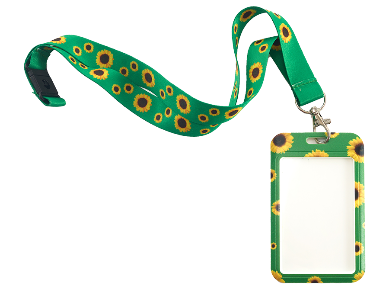 A green lanyard with a sunflower pattern on it.