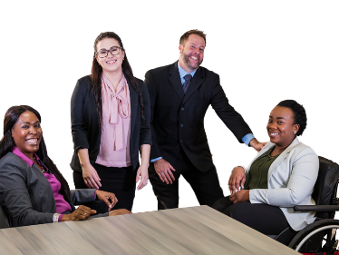 A group of 4 government workers sitting at a table.