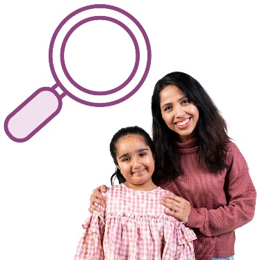 A magnifying glass next to a parent with their child.