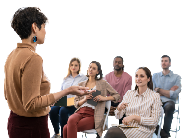 A person presenting to a group of people who work for the government.