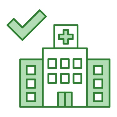 A tick next to a hospital building.