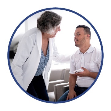 A doctor supporting a person.