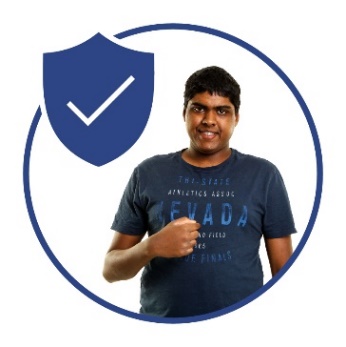 A person with disability pointing to themself. Above them is a safety icon.